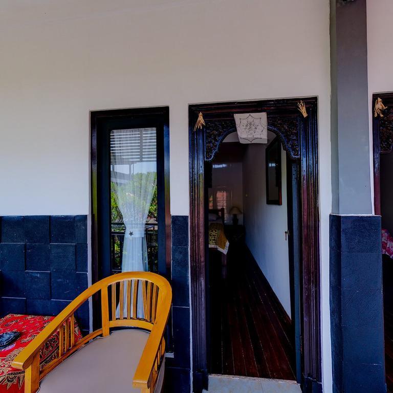 Tirta Yoga Inn Падангбай Номер фото
